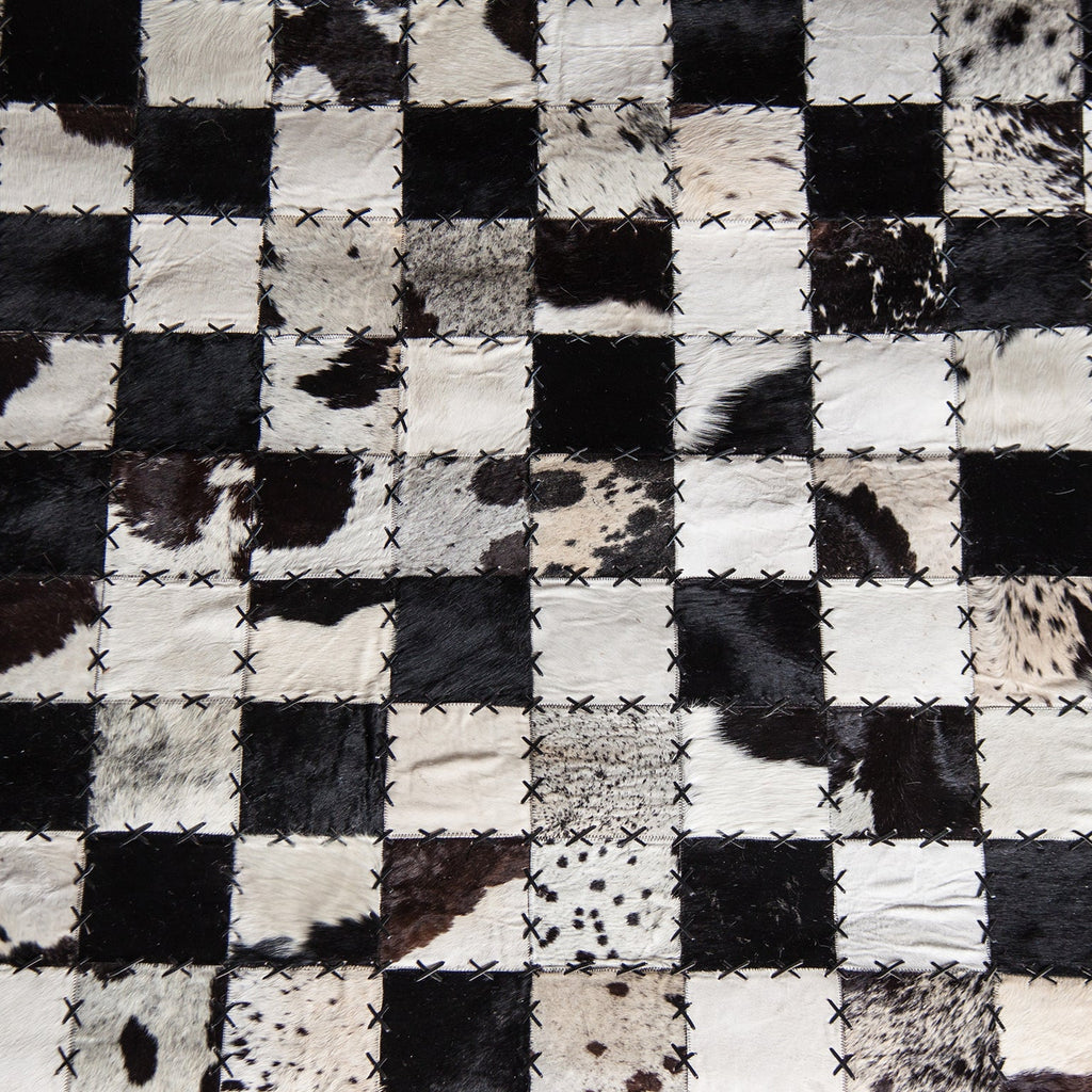 Nordic Leder-Patchwork Teppich: Schwarz-Weiß Eleganz - Maison Oudh